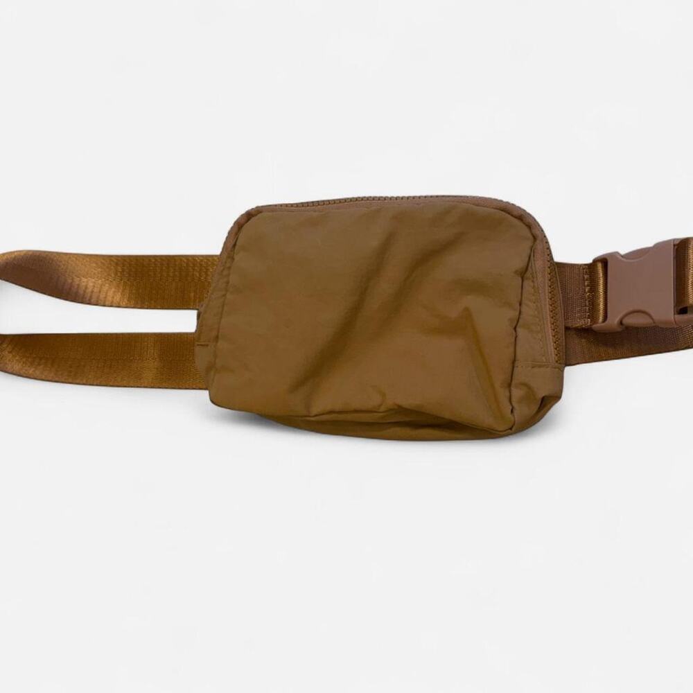 Burnt orange waist bag with adjustable straps